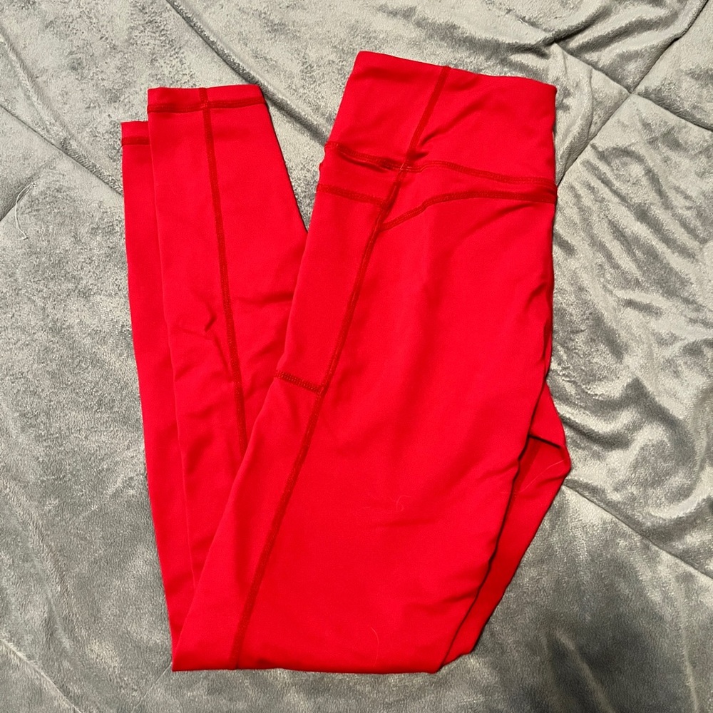 Red Senita leggings size small midrise. Seamed waist
